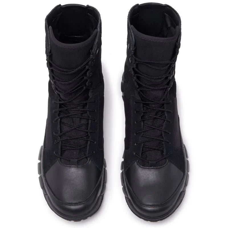 Chaussures rangers cuir femme noires vue du dessus, design robuste et lacets croisés, modèle militaire